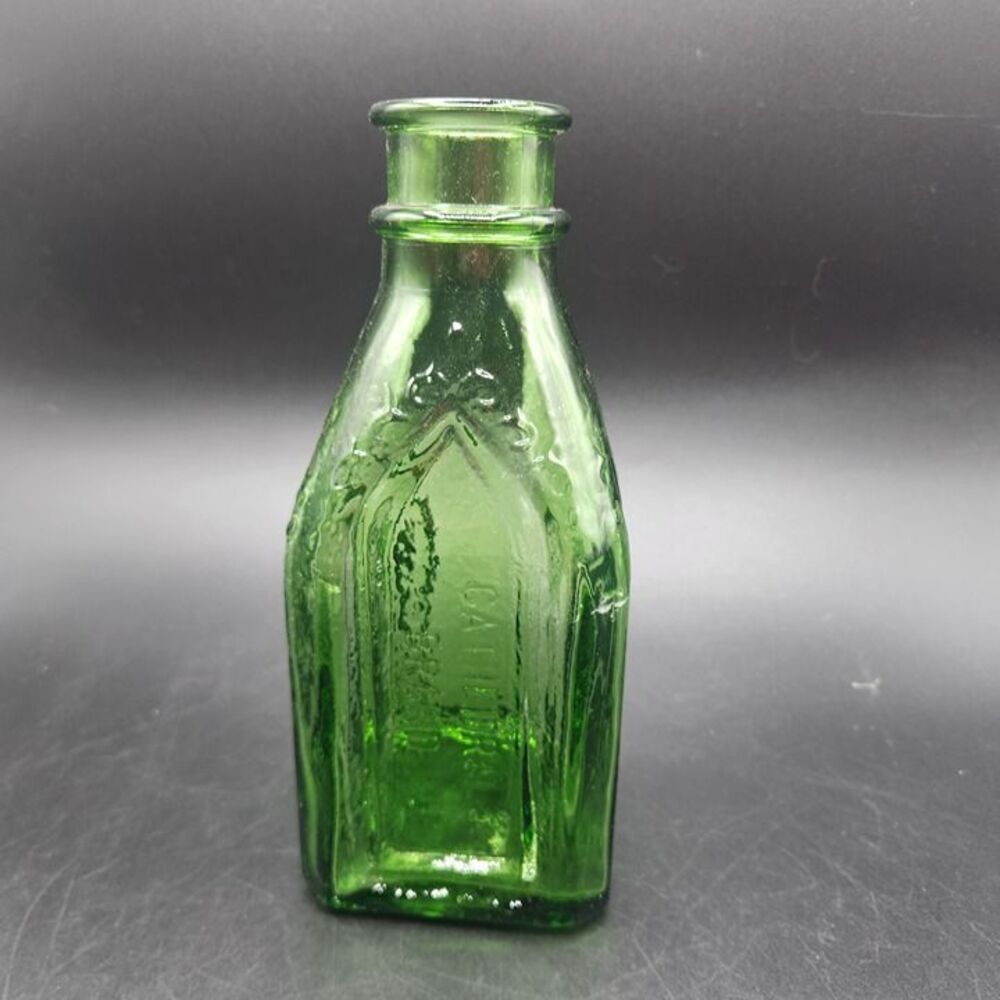VINTAGE CHIEF WAHOO ELECTRIC TONIC WALBRIDGE DUNSMUIR CAL BOTTLE - Green 8"